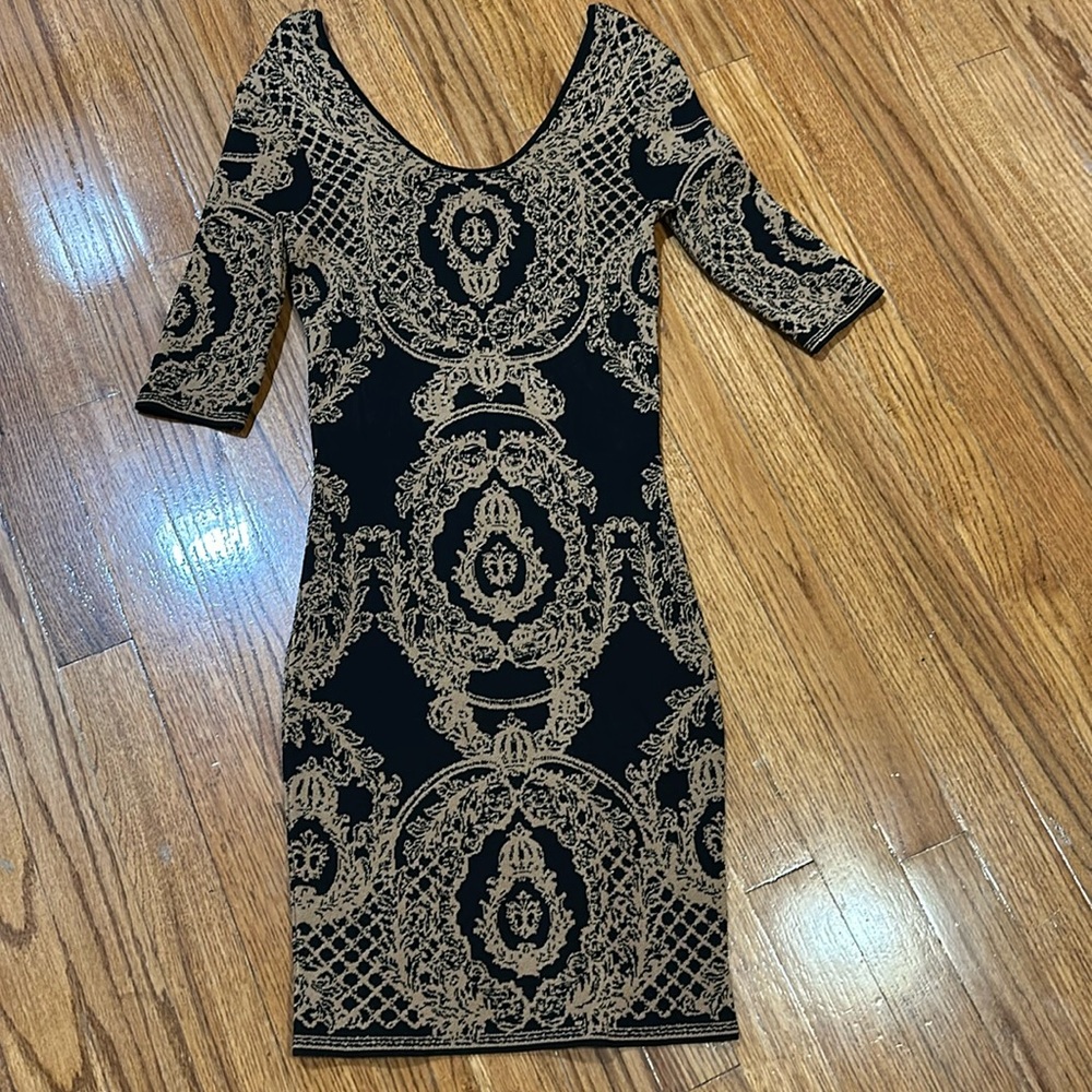 Black and gold brocade dress